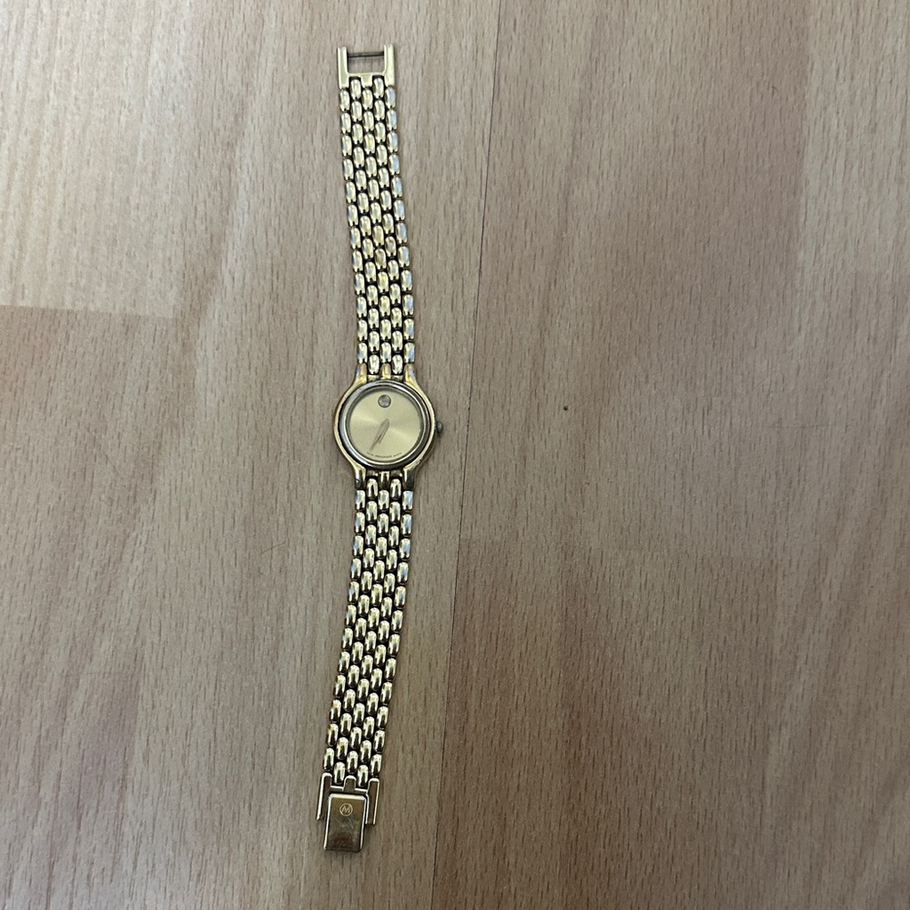 Vintage Womans Museum Gold Tone